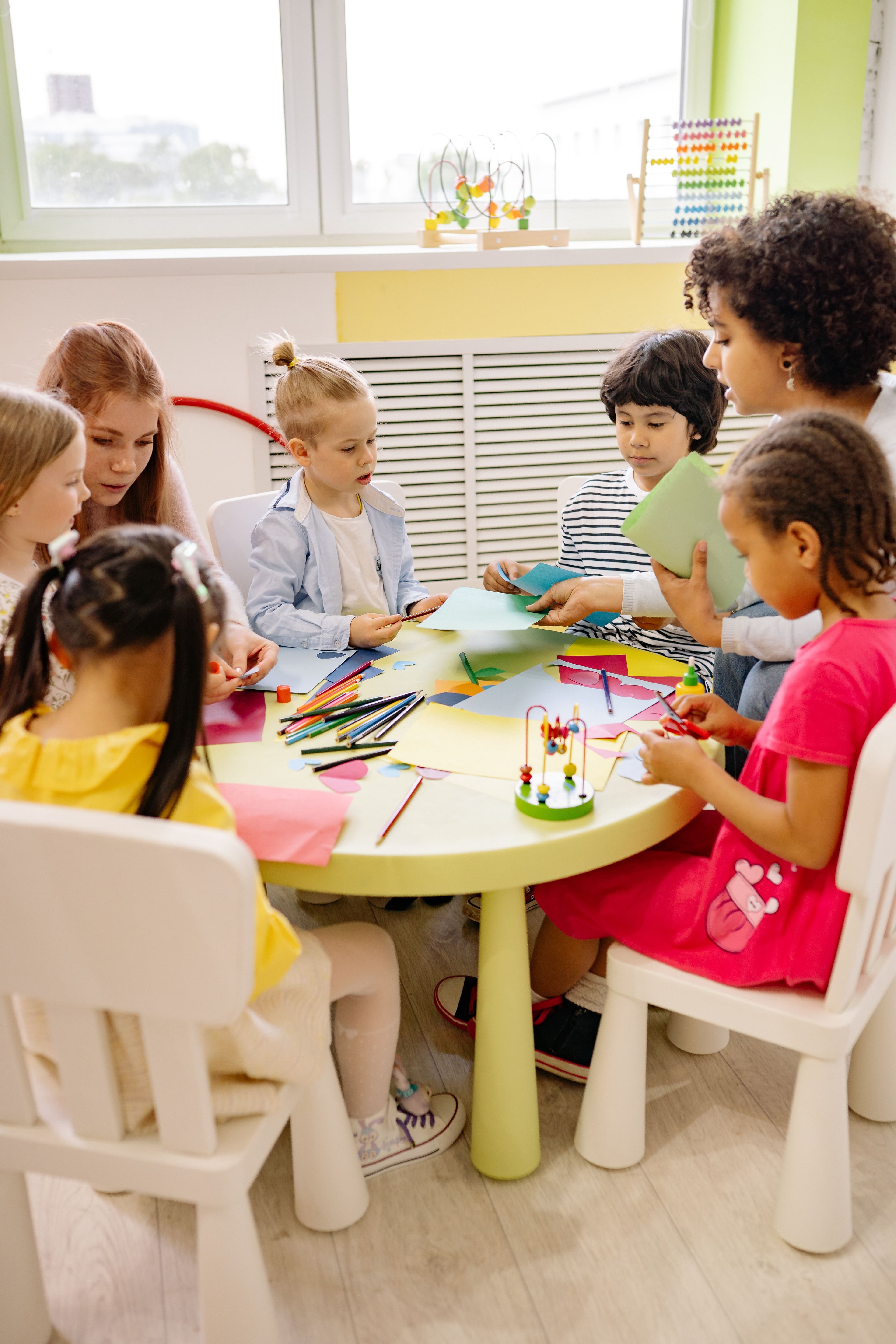 School-age children engaged in day home activities