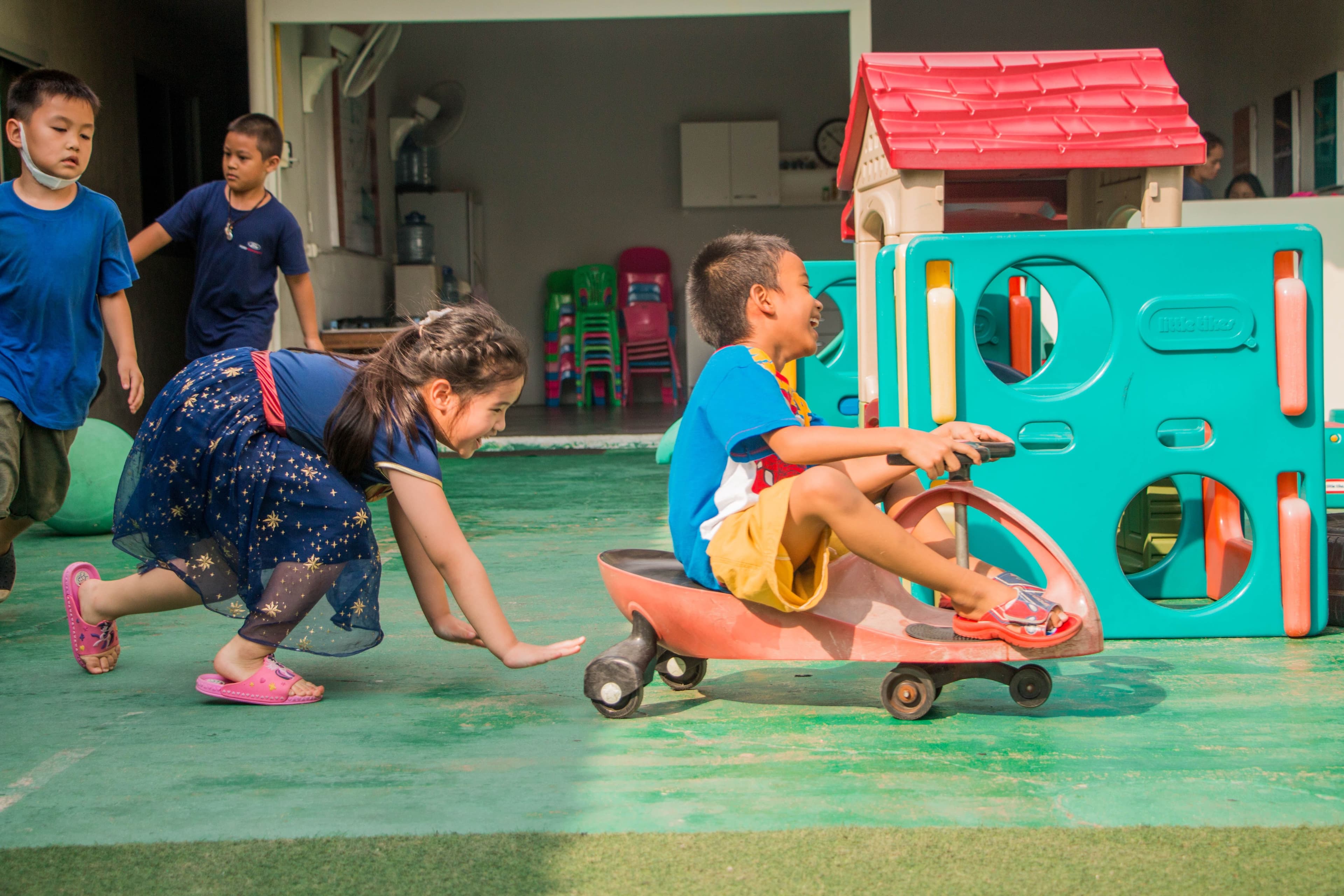Children playing together in a bright home setting